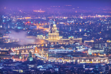 Вид на город со смотровой площадки Панорама 360 на высотки в свете ночных фонарей и Высотка на Котельнической набережной, башня Федерация Москва-Сити, Москва